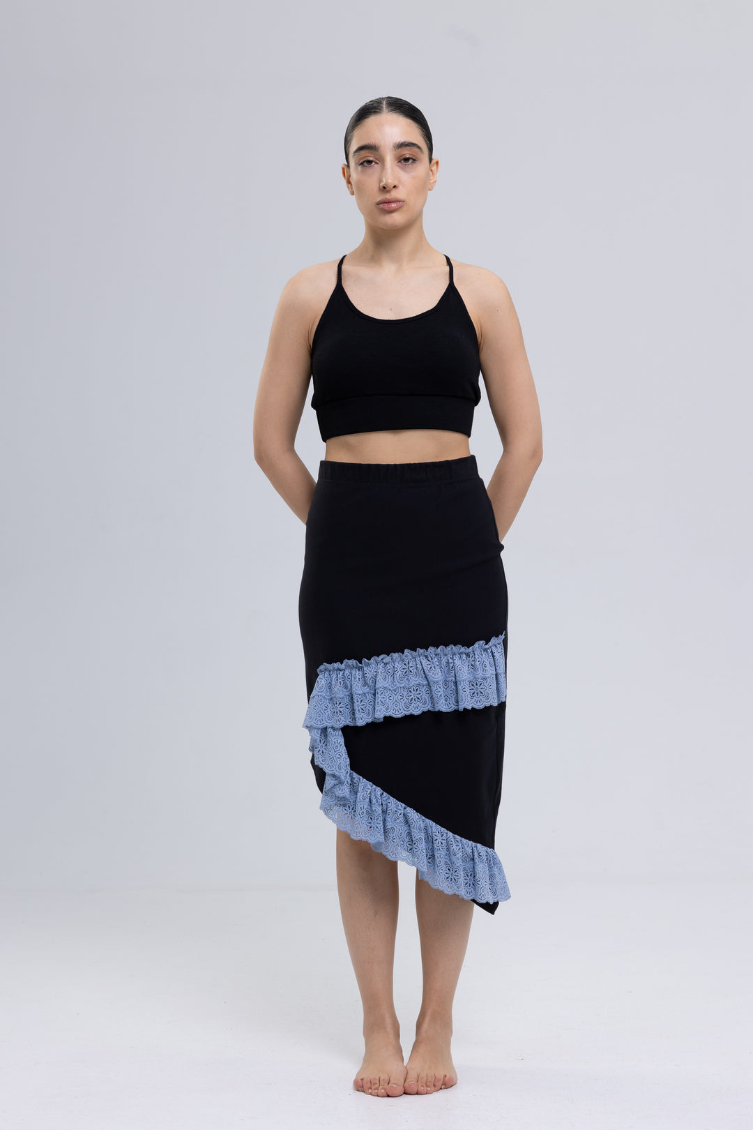 Black asymmetrical midi skirt with sky blue lace ruffles
