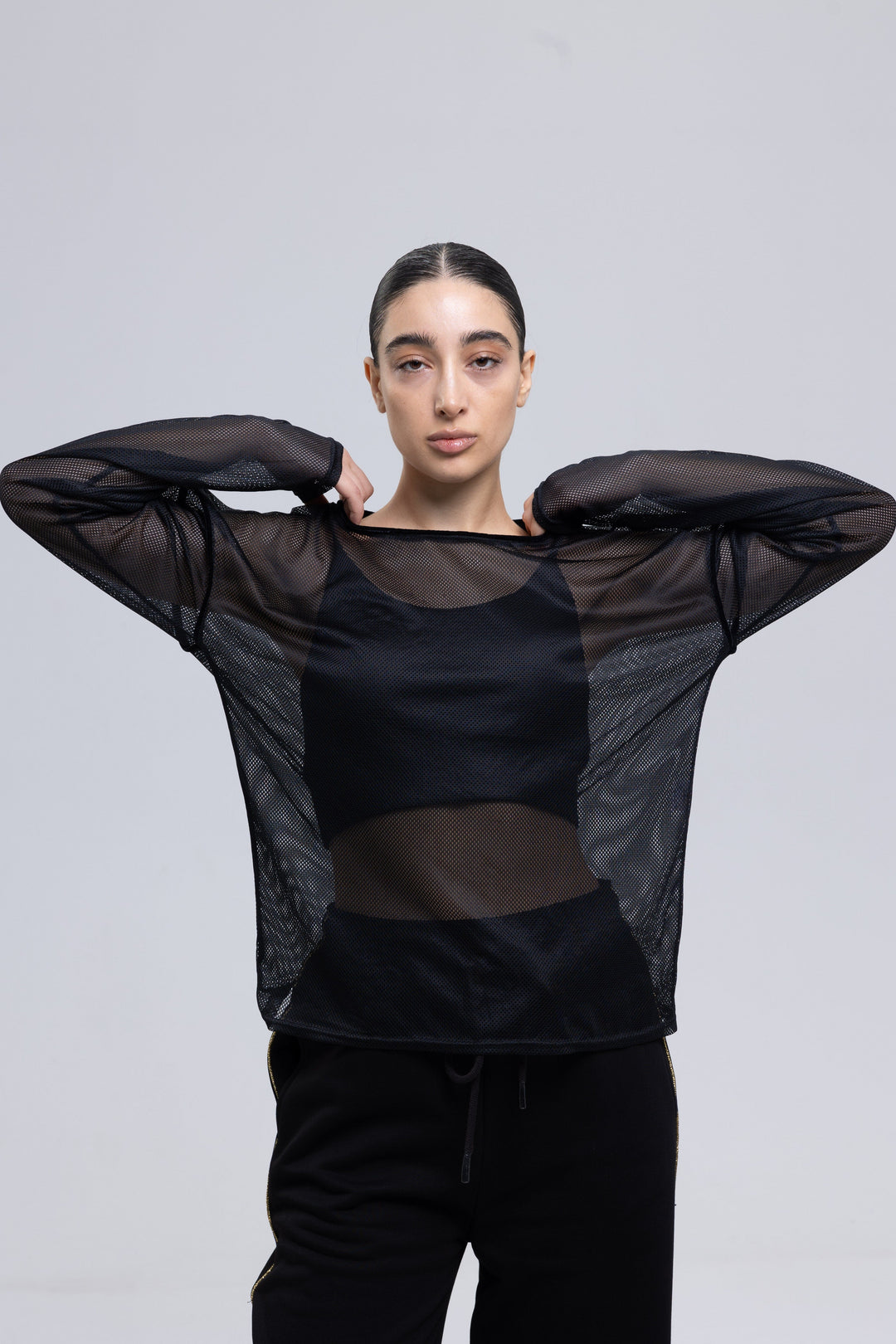 Black mesh top with boat neckline