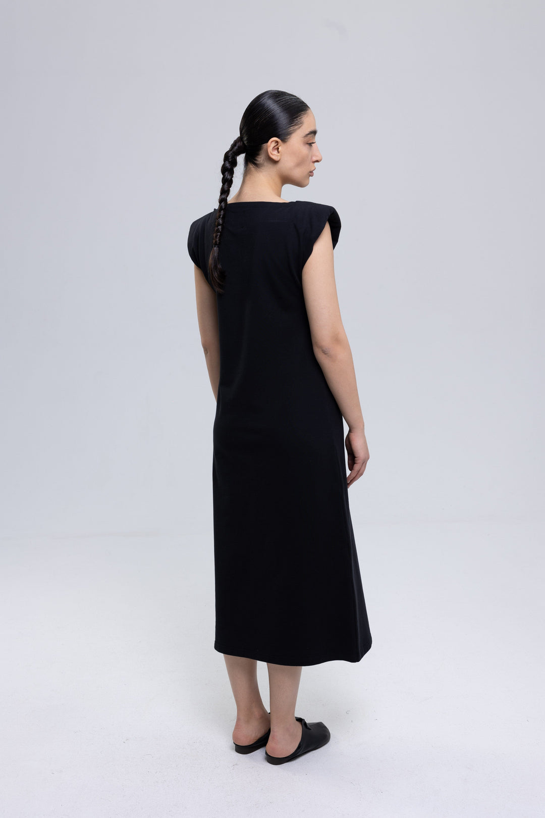 Women's black cotton midi dress with shoulder pads by Baleni