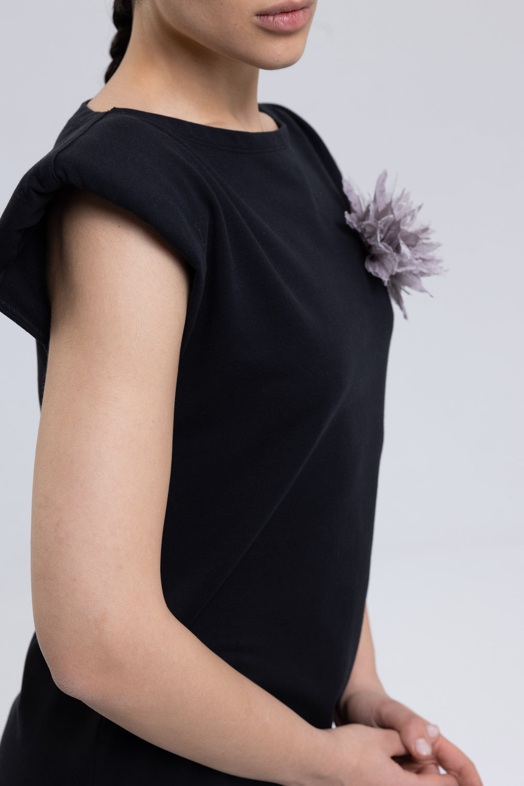 Black midi dress with pleated neckline