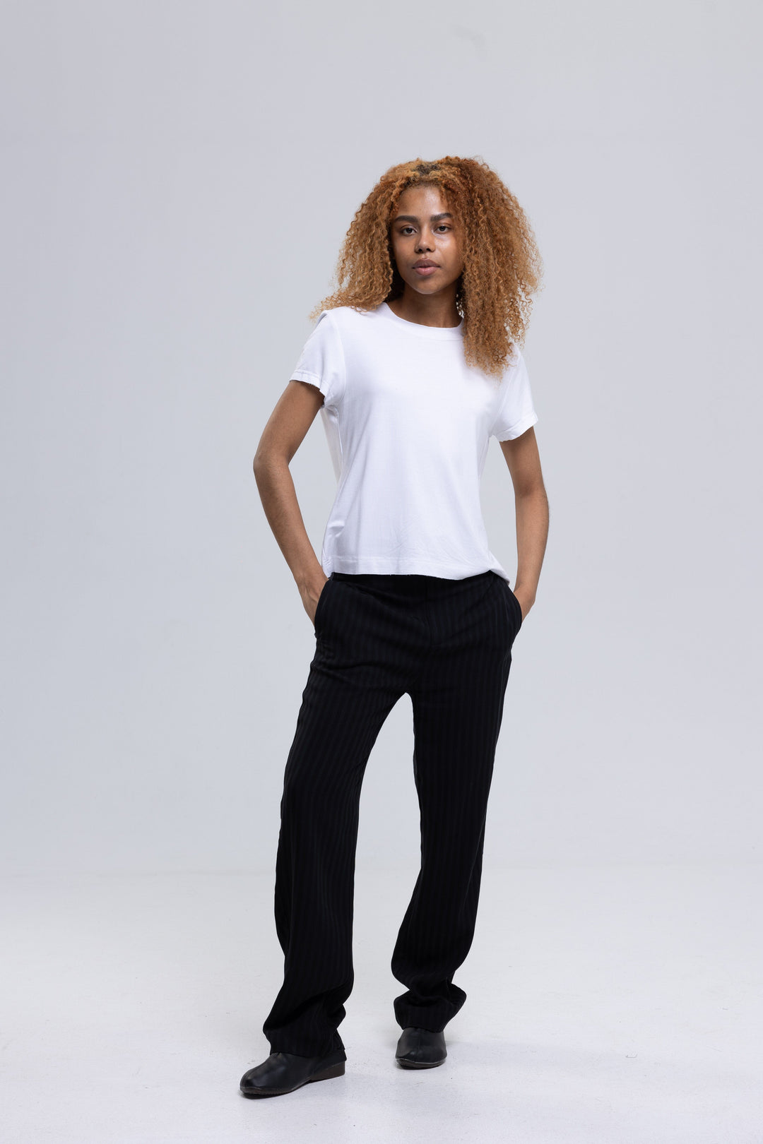 Black two-tone striped cropped trousers for women