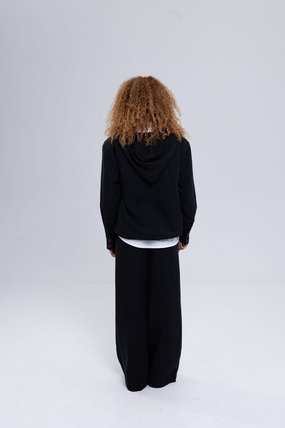 Women's black striped woven tracksuit by Baleni