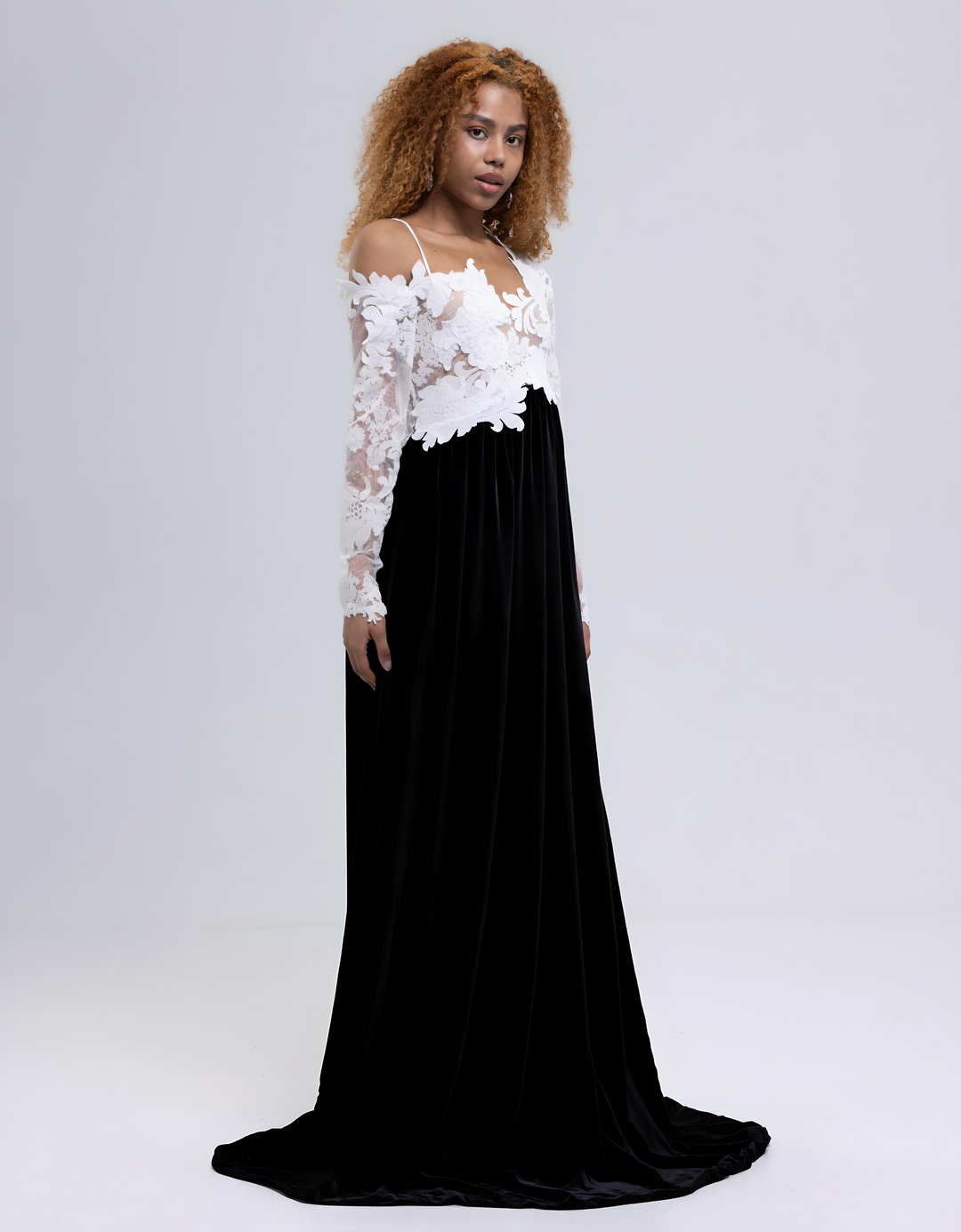 Black and white velvet evening gown with white lace bodice, long lace sleeves and floor-length black skirt - Baleni