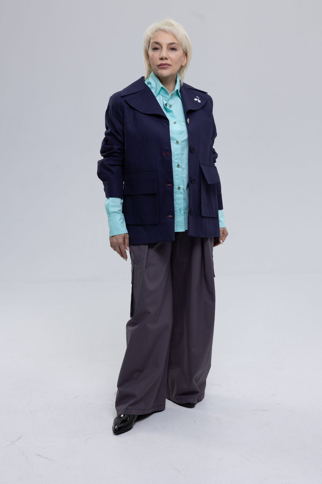Women's blue oversized blazer with flap pockets by Baleni
