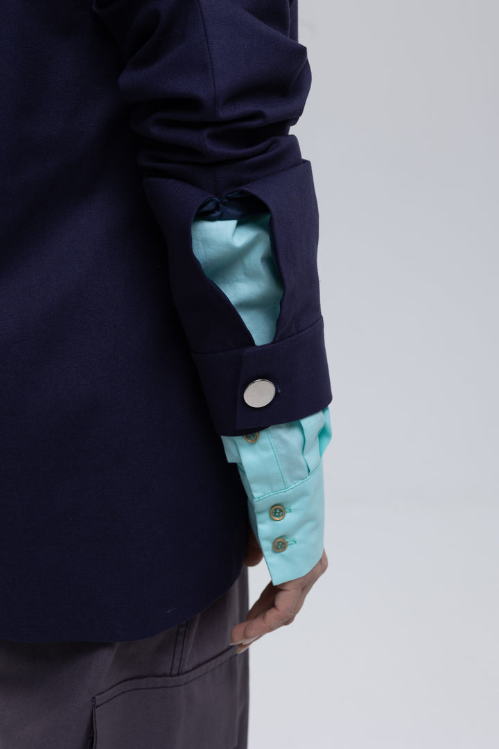 Boxy blue cotton blazer with wide notched lapels
