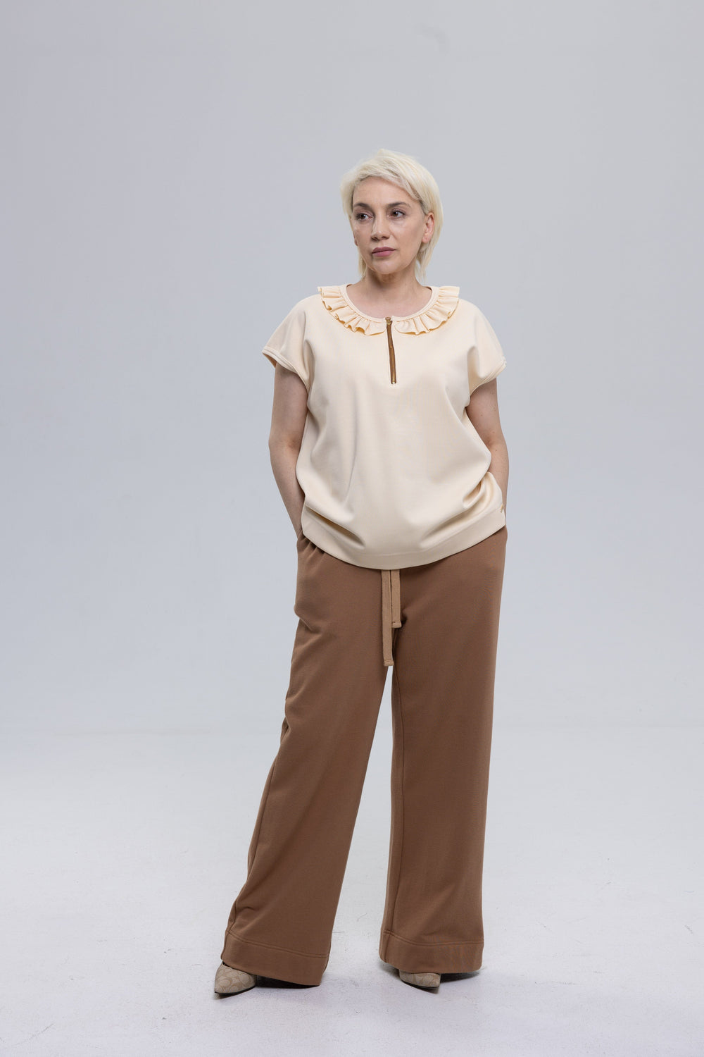 Women's bone french terry ruffle top by Baleni