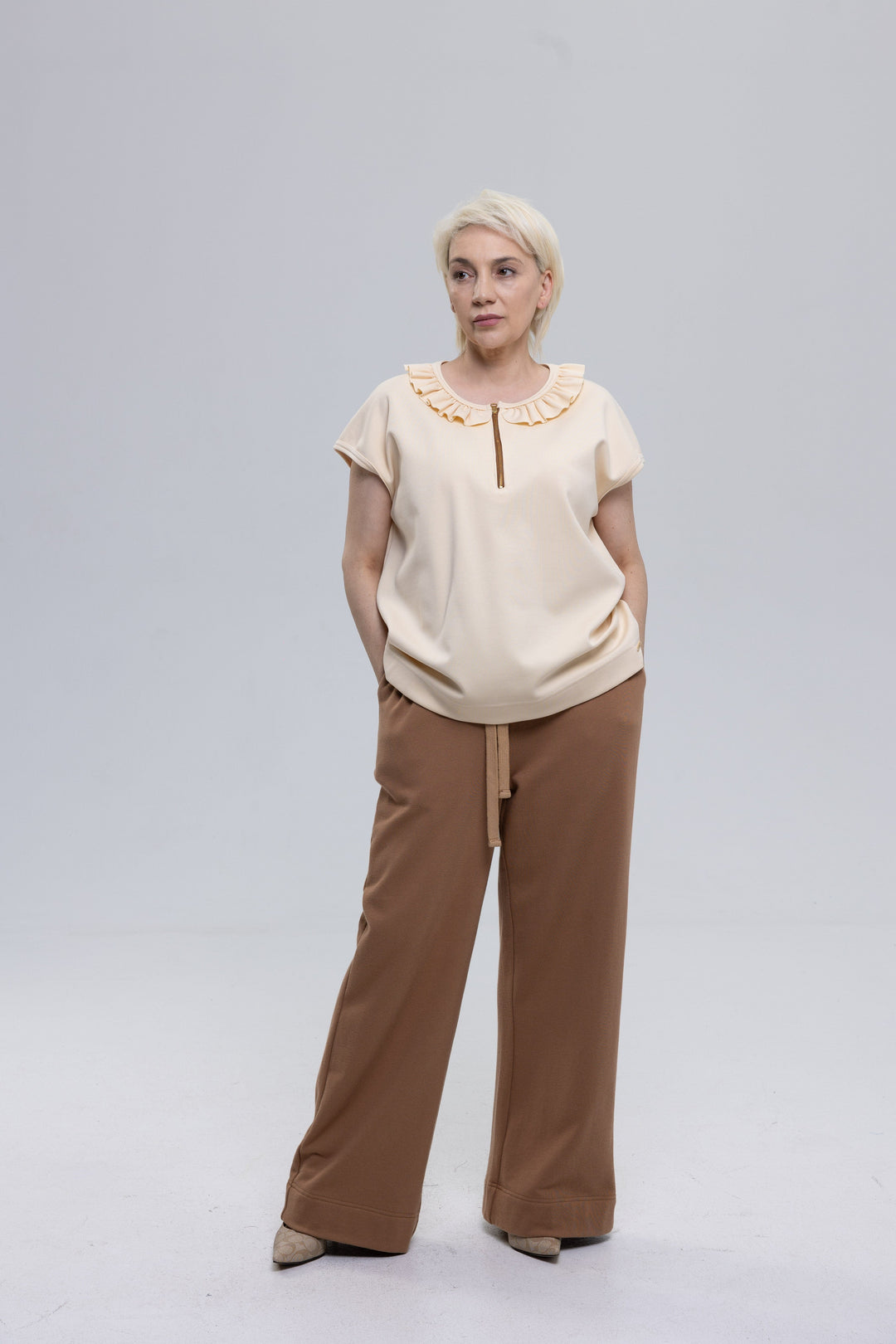 Women's bone french terry ruffle top by Baleni