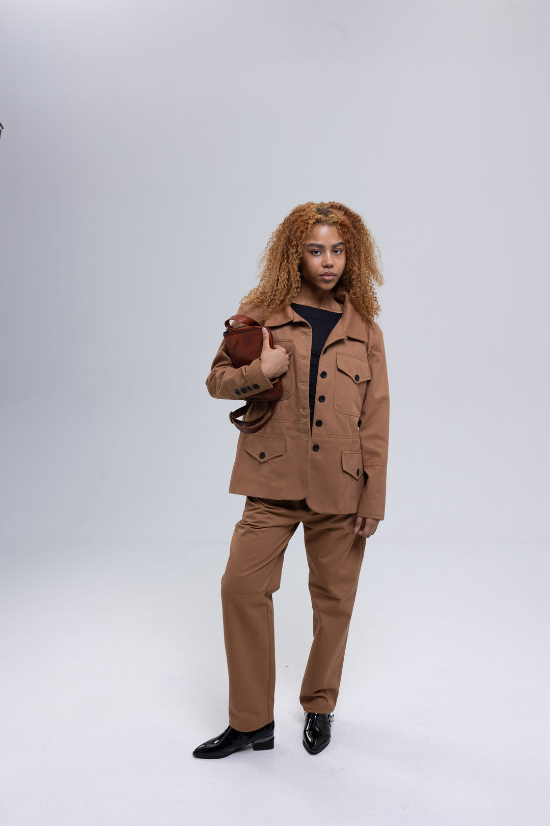 Women's brown tapered cotton pants by Baleni