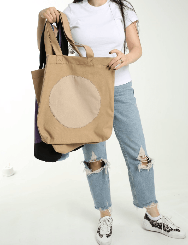 Two-tone canvas tote bag with circular patch
