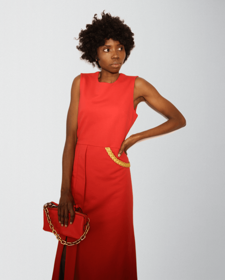 Coral midi dress with pleated side slit