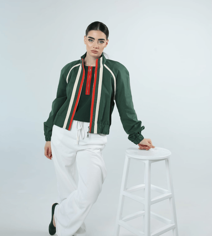 Cropped cotton canvas bomber jacket in green with red zip and cream stripes, front view - Baleni