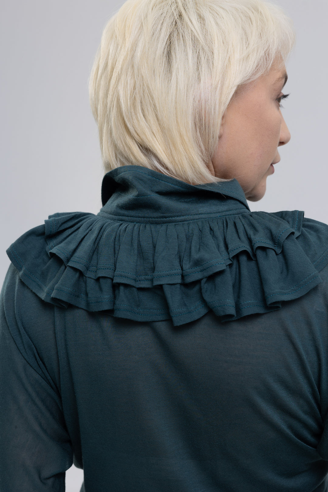 Green blouse with ruffle collar