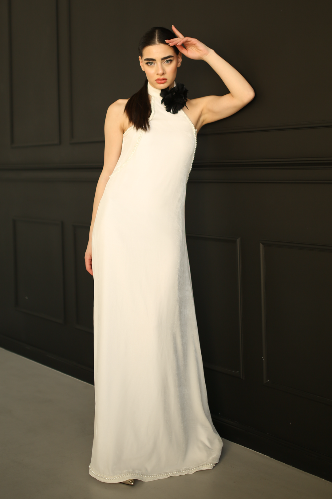 Off-white halter neck evening gown in silk velvet with feather flower appliqué - Baleni