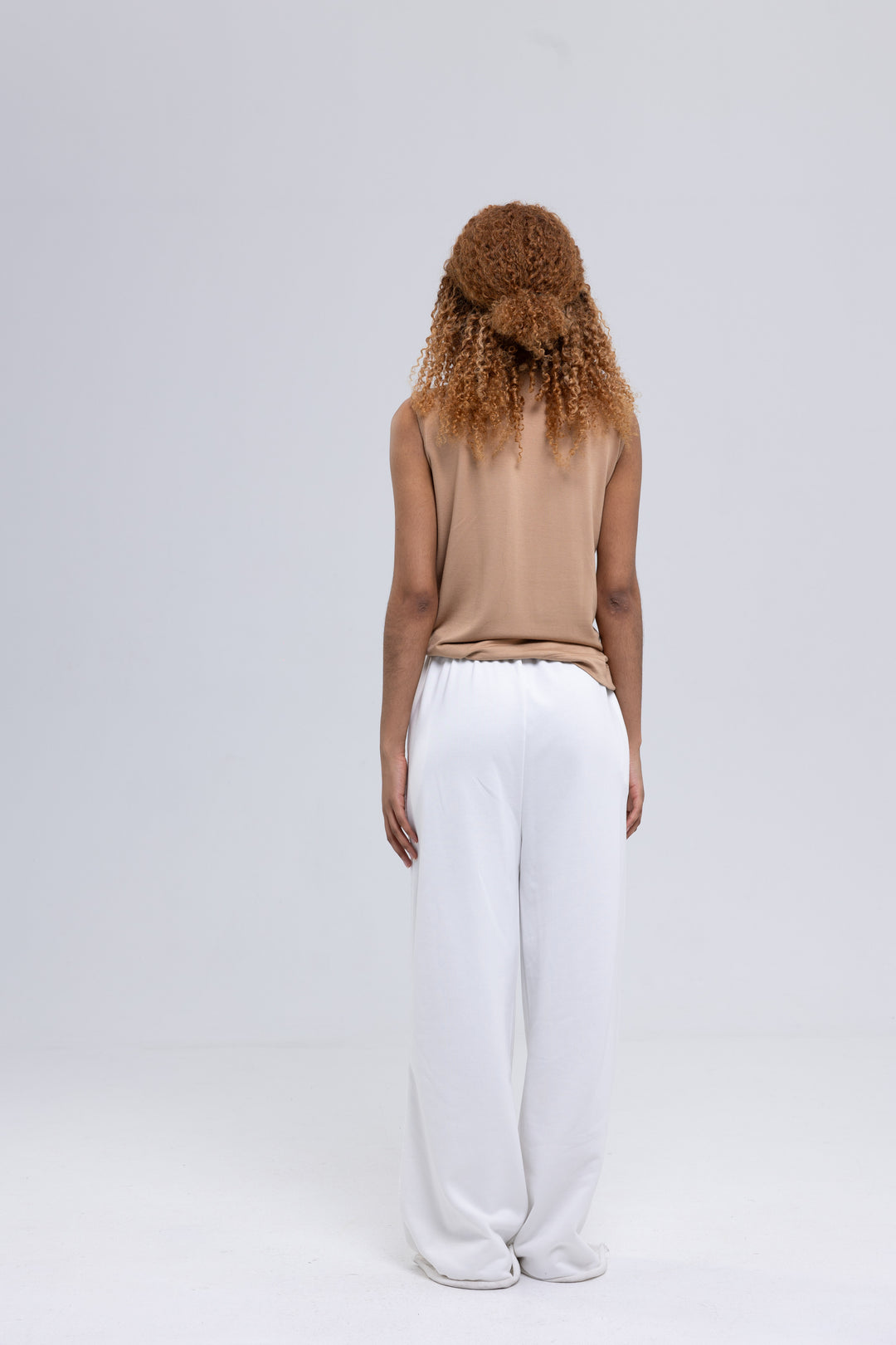 High neck sleeveless top with layered ruffles - Baleni
