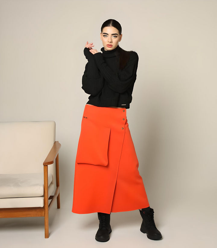 Orange A-line maxi skirt for women with large front pocket, styled with a black knit and boots - Baleni