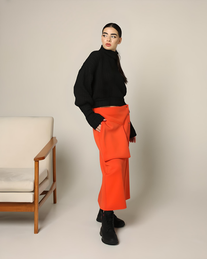 Side view of an orange cotton maxi skirt with front pocket and snap buttons - Baleni