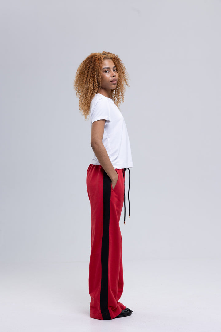 Pinkish red sweatpants with drawstring waistband
