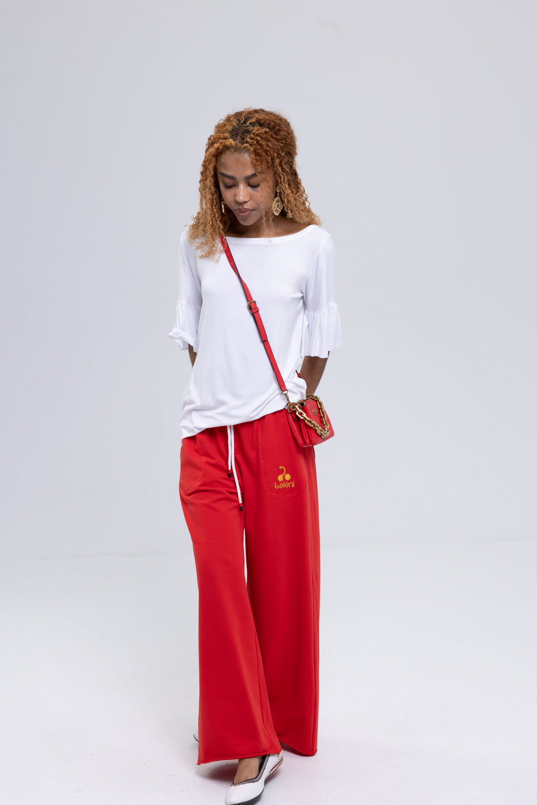 Women's red French terry sweatpants by Baleni