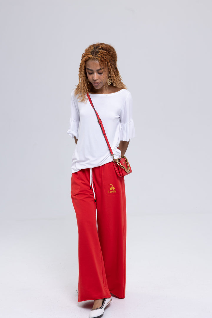 Women's red French terry sweatpants by Baleni