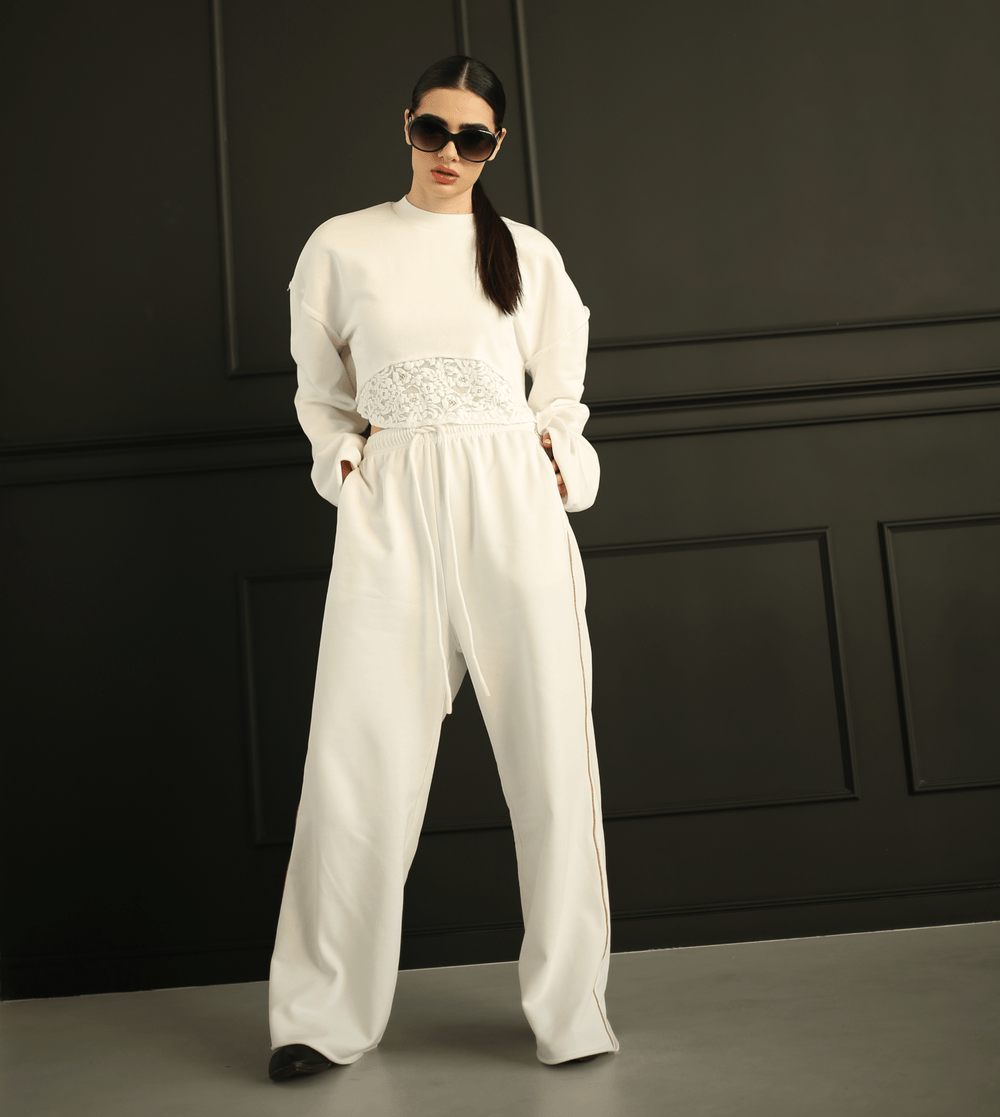Women's white tracksuit with gold piping trackpants by Baleni