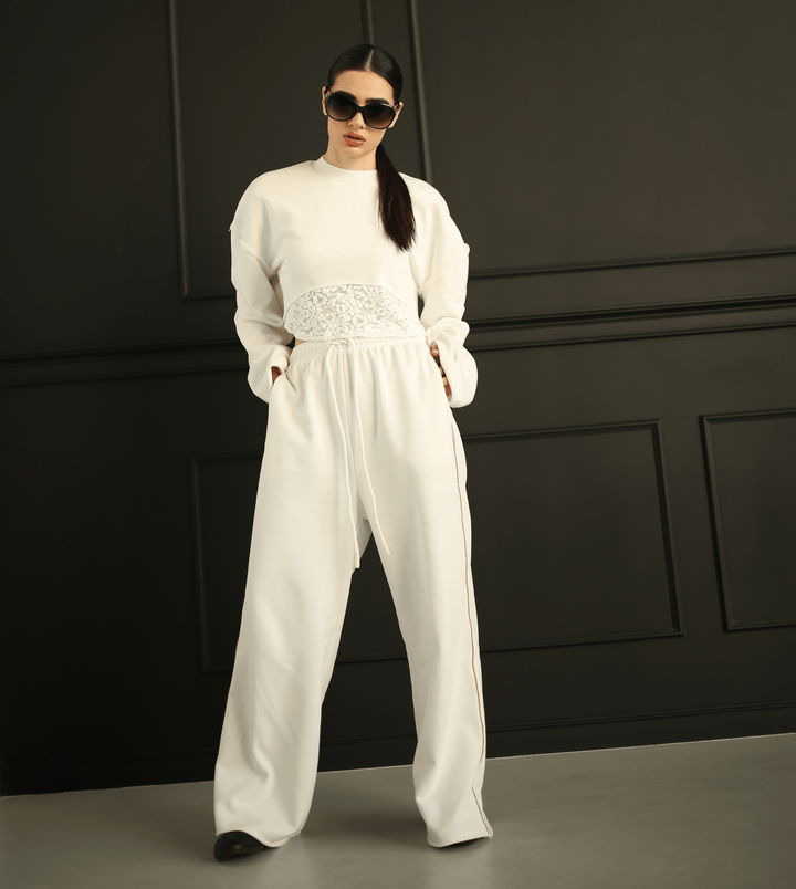 Women's white tracksuit with gold piping trackpants by Baleni