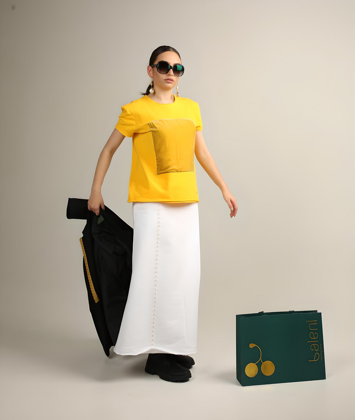 White A-line maxi skirt with chamomile trim