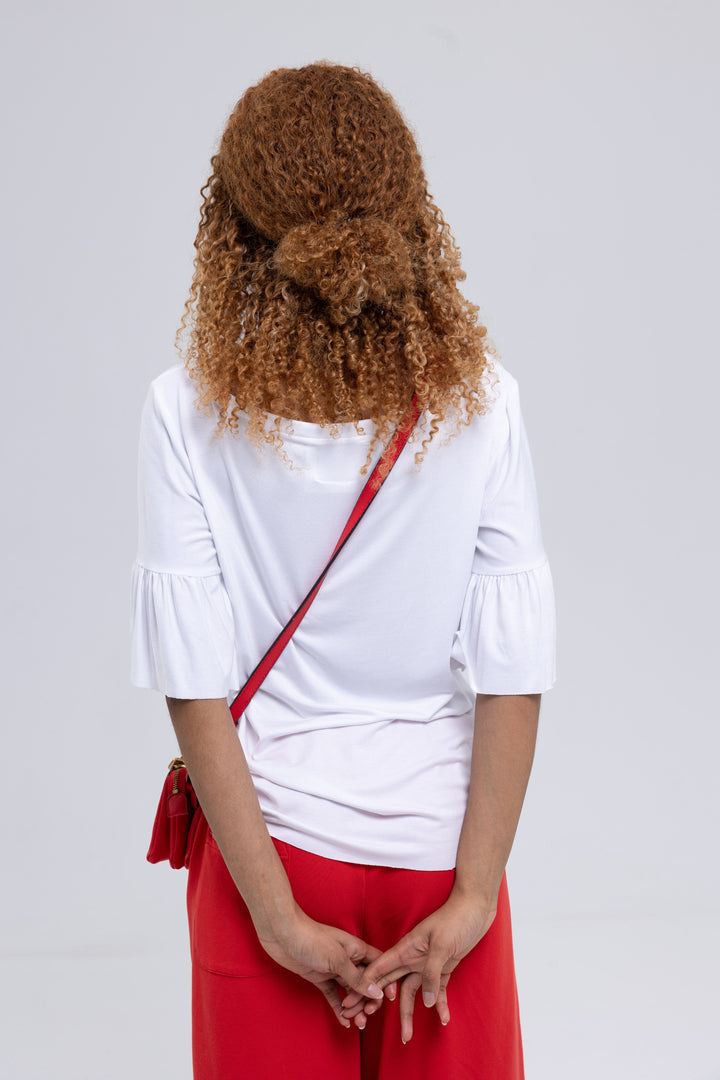 Women's white boat neck blouse by Baleni