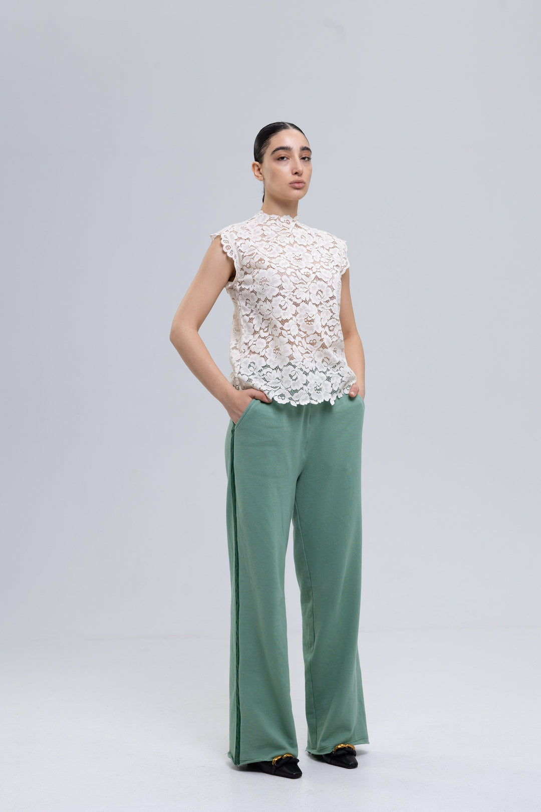 Women's white guipure lace top with scalloped edges by Baleni