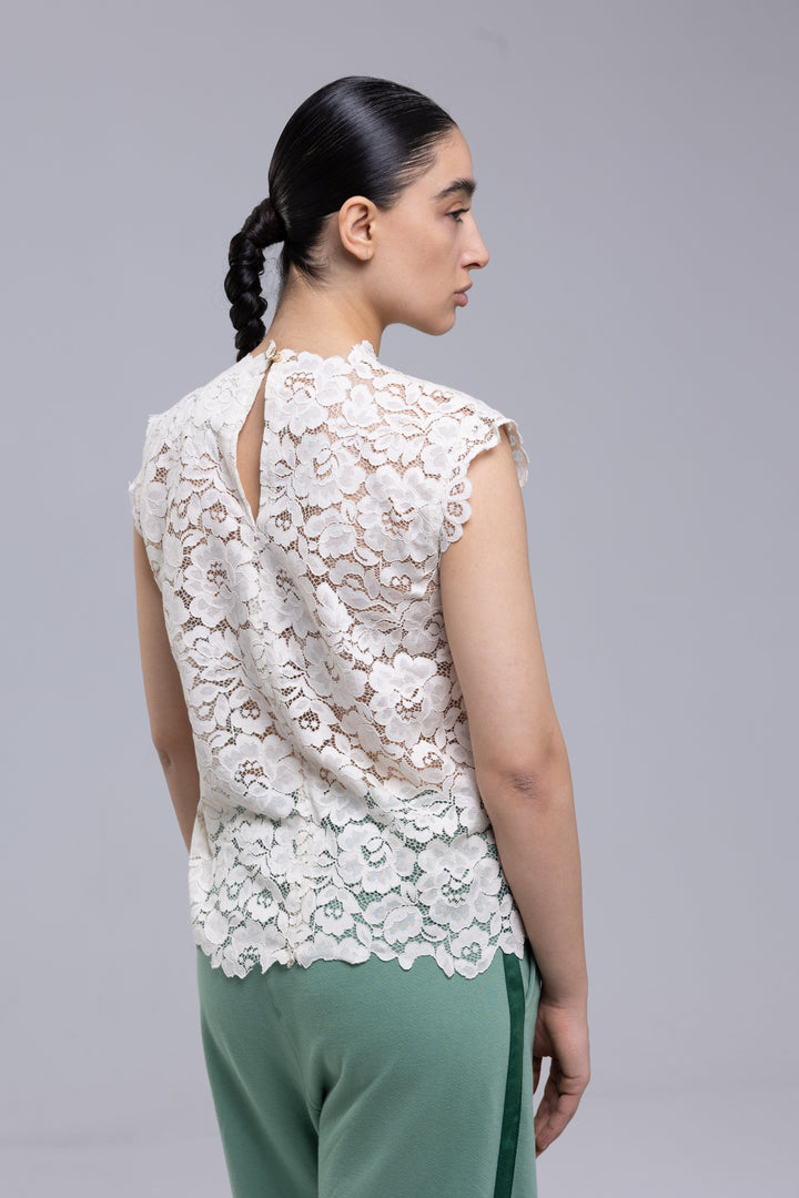White lace top with jewel neckline