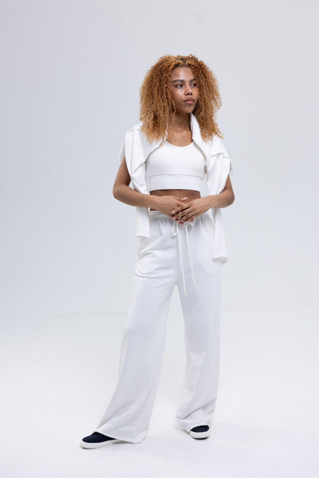 Cropped laced sweatshirt and ruffle trackpants
