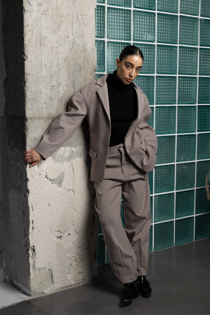 Women's grey suit in mauve gray with relaxed blazer and tapered trousers