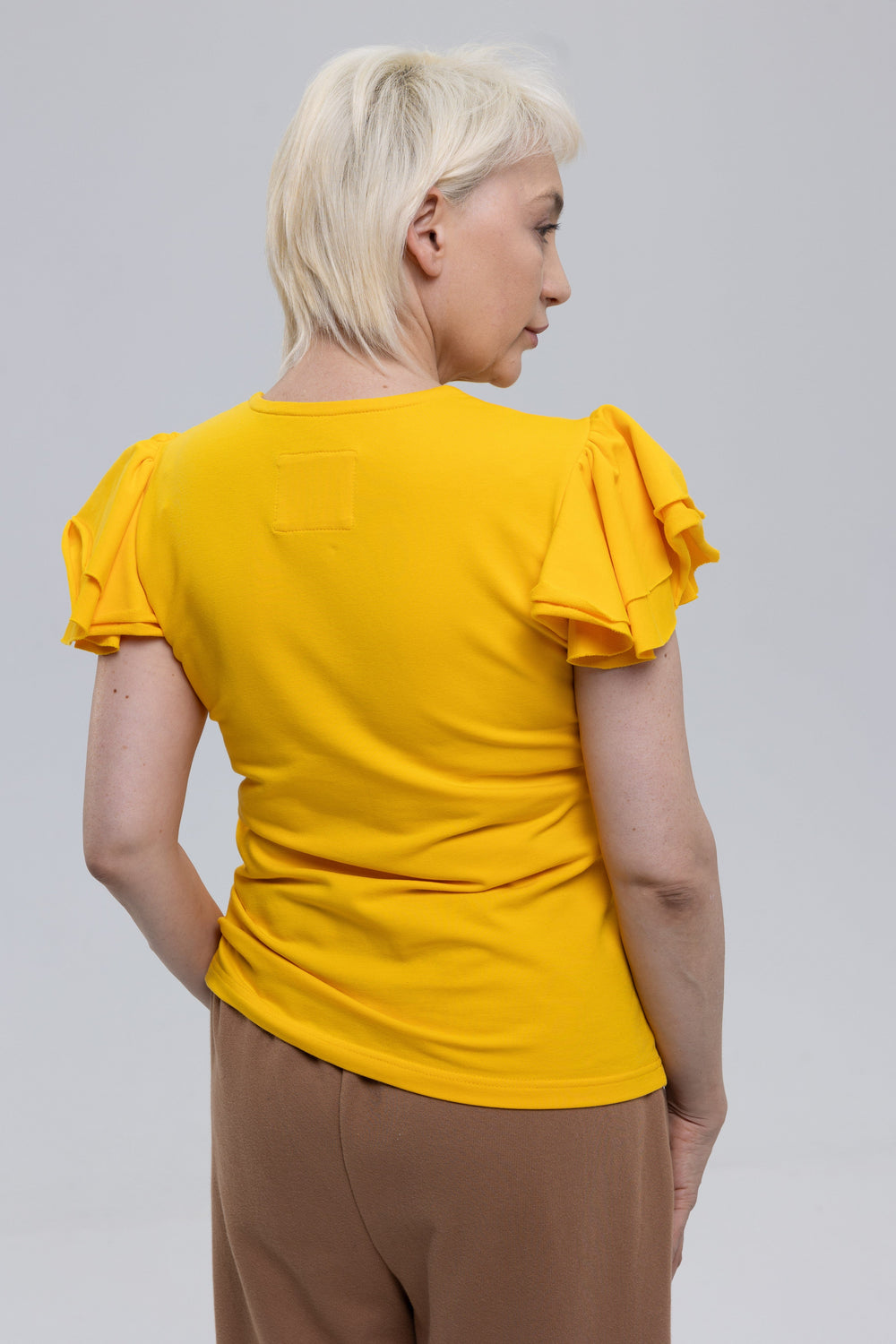 Women's yellow ruffle sleeve top by Baleni