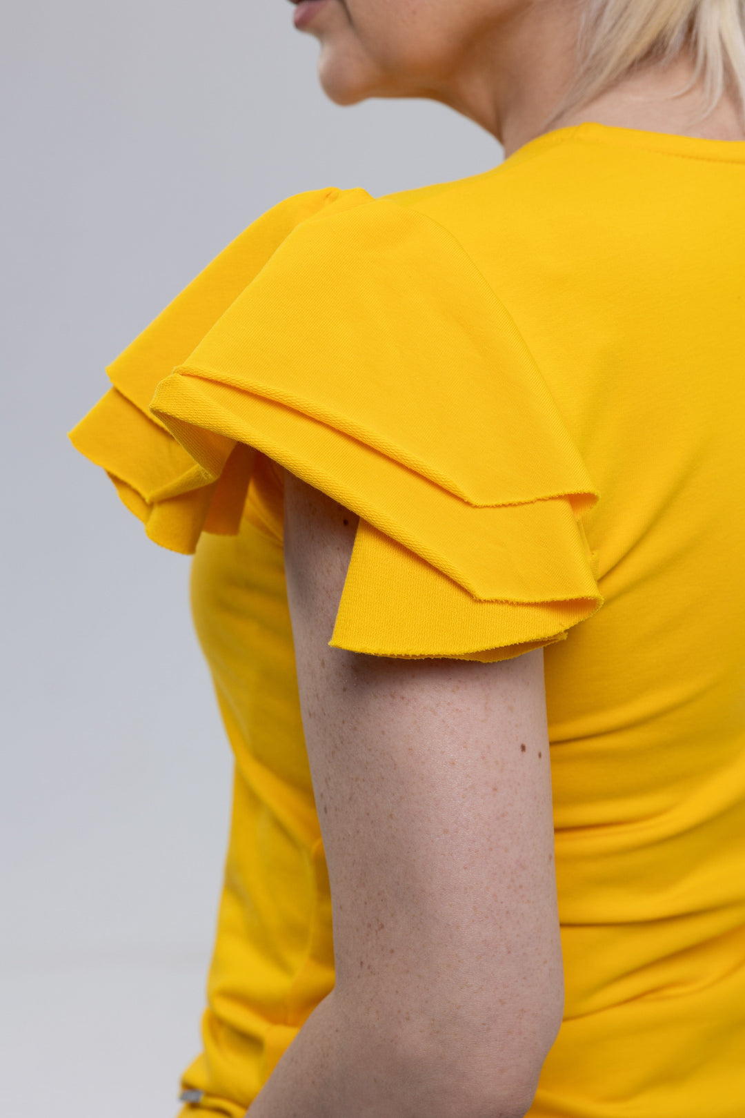 Yellow flutter sleeve top made in Armenia